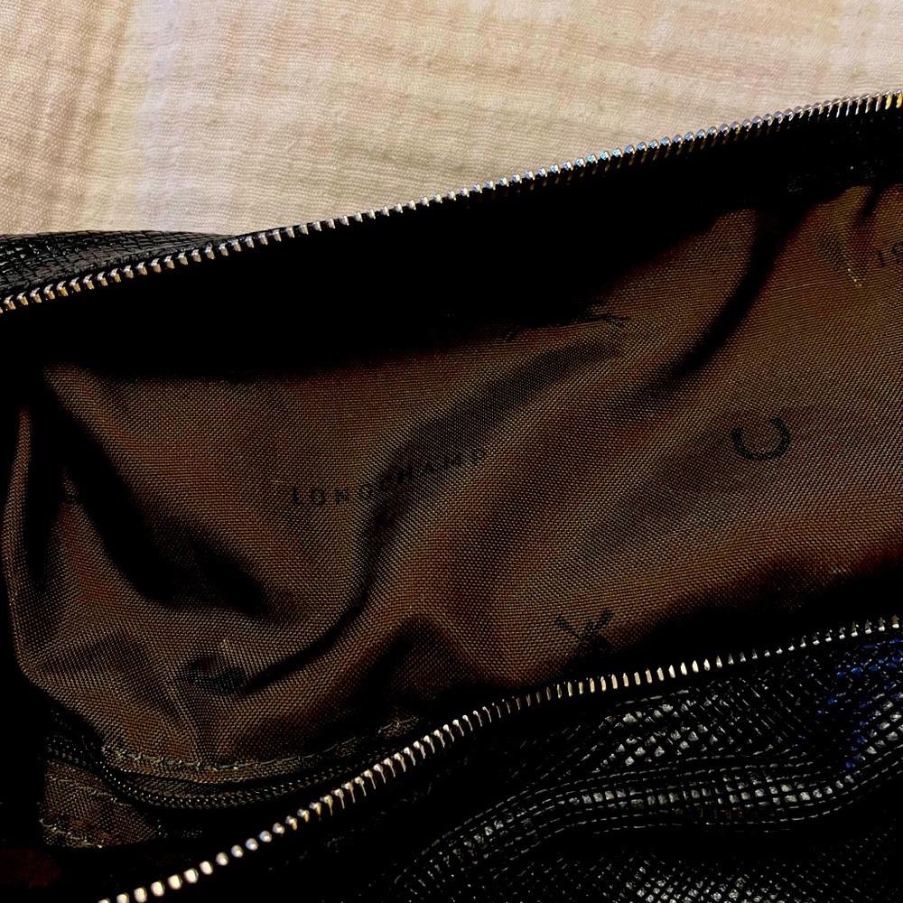 Longchamp black tote or purse.